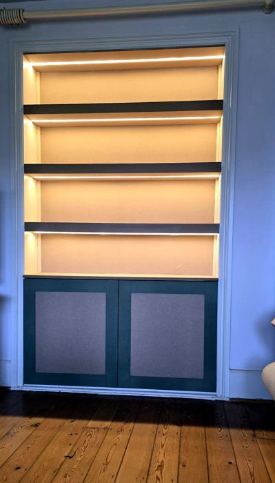 Backlit shelved media wall
